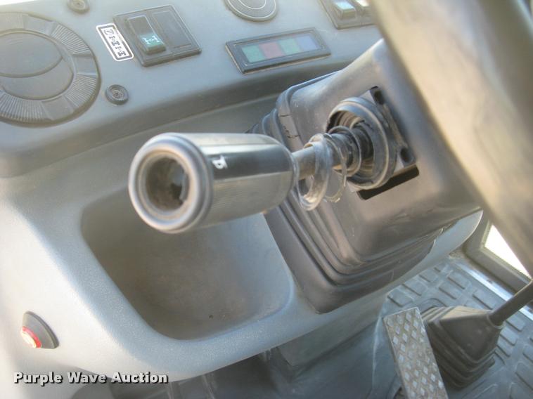 image for item L2371 New Holland 555E backhoe