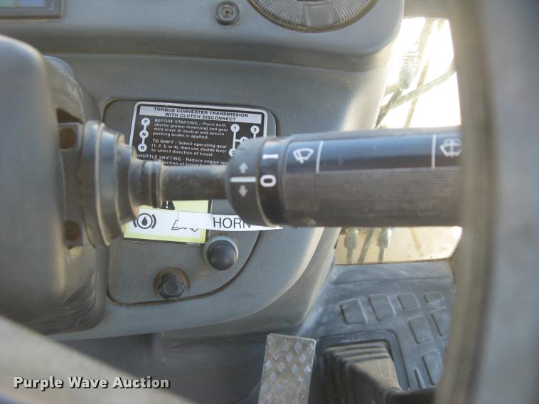 image for item L2371 New Holland 555E backhoe