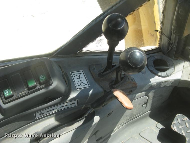 image for item L2371 New Holland 555E backhoe