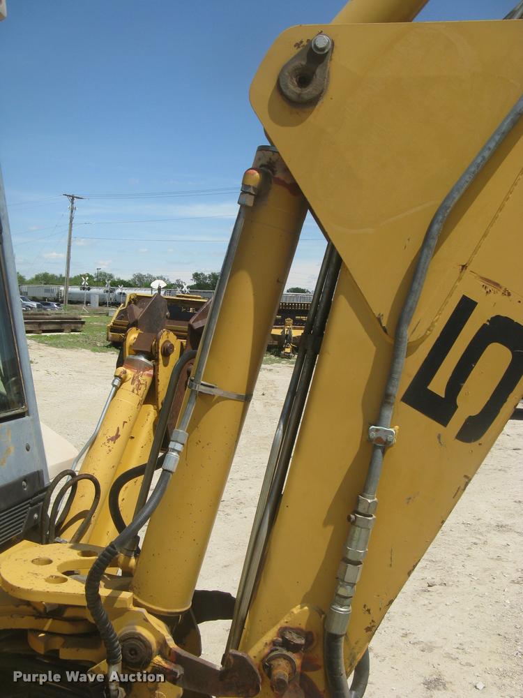 image for item L2371 New Holland 555E backhoe