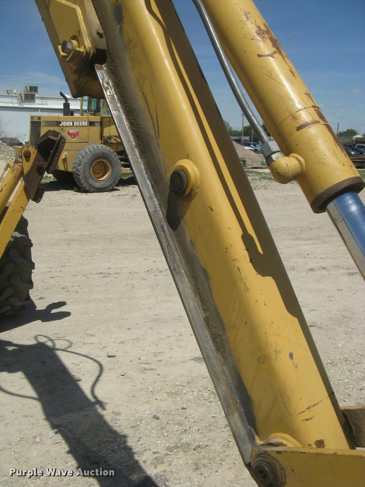 image for item L2371 New Holland 555E backhoe