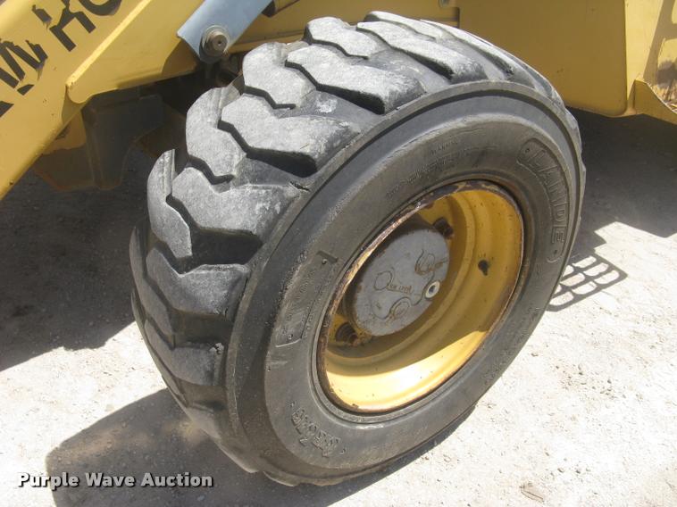 image for item L2371 New Holland 555E backhoe