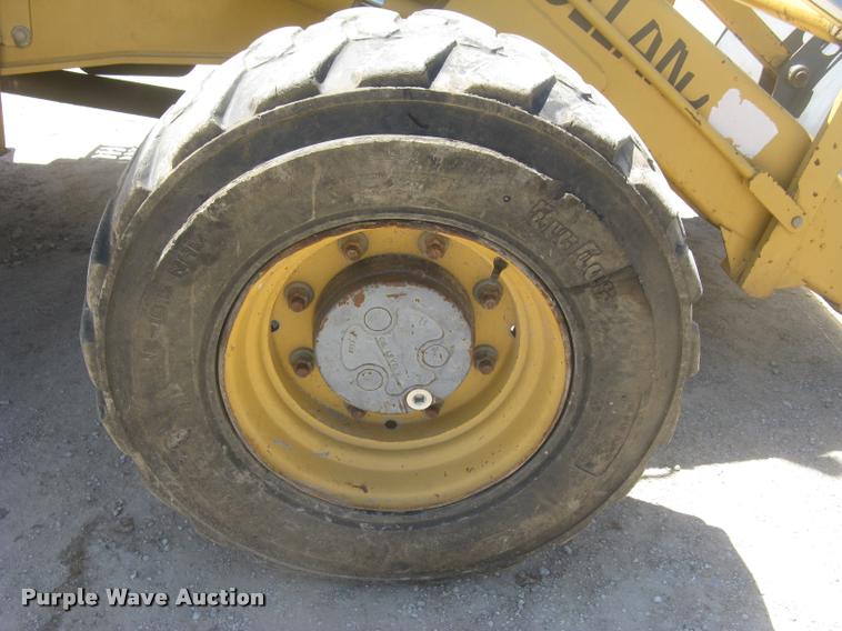 image for item L2371 New Holland 555E backhoe