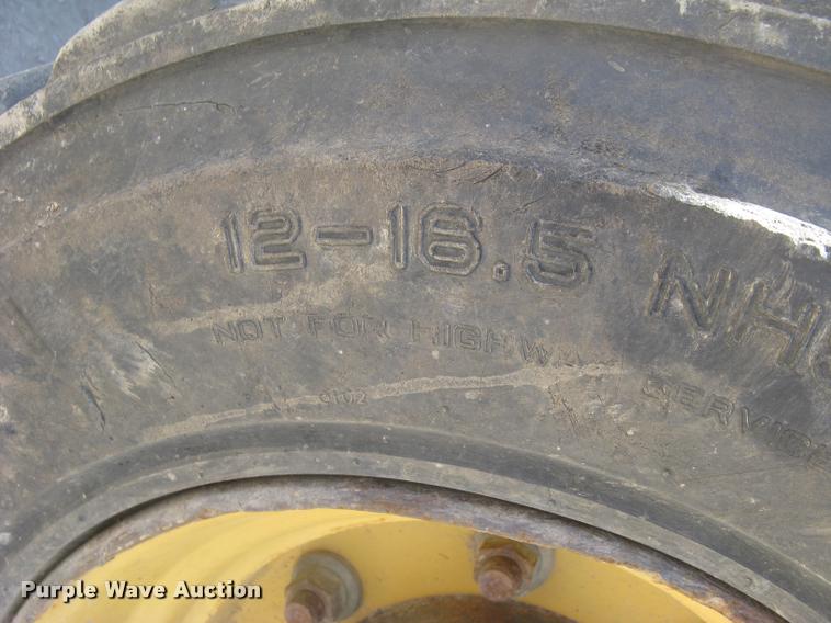 image for item L2371 New Holland 555E backhoe