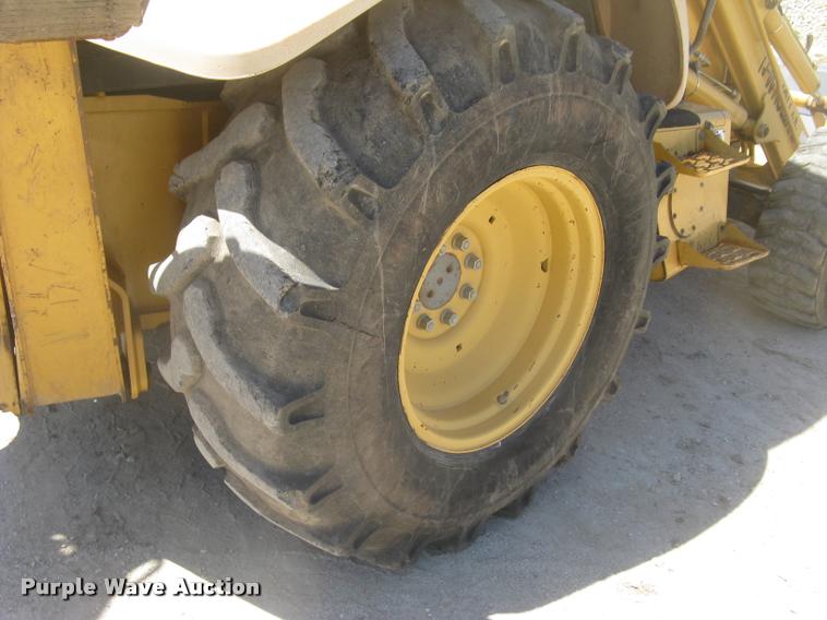 image for item L2371 New Holland 555E backhoe