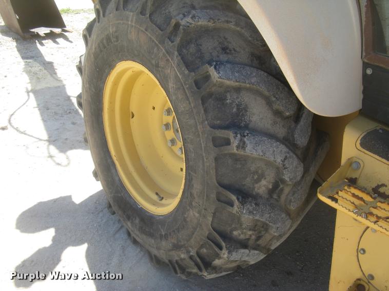 image for item L2371 New Holland 555E backhoe