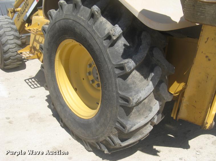 image for item L2371 New Holland 555E backhoe