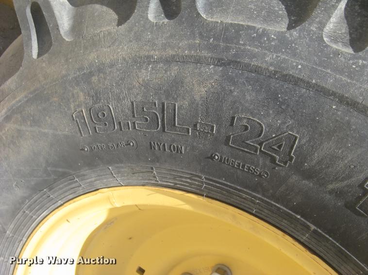 image for item L2371 New Holland 555E backhoe