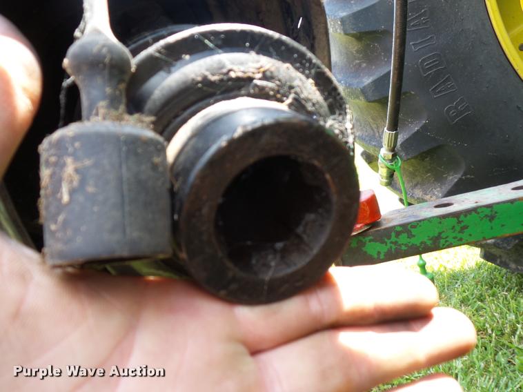 image for item DD9439 2014 New Holland Rollbelt 560 specialty crop baler