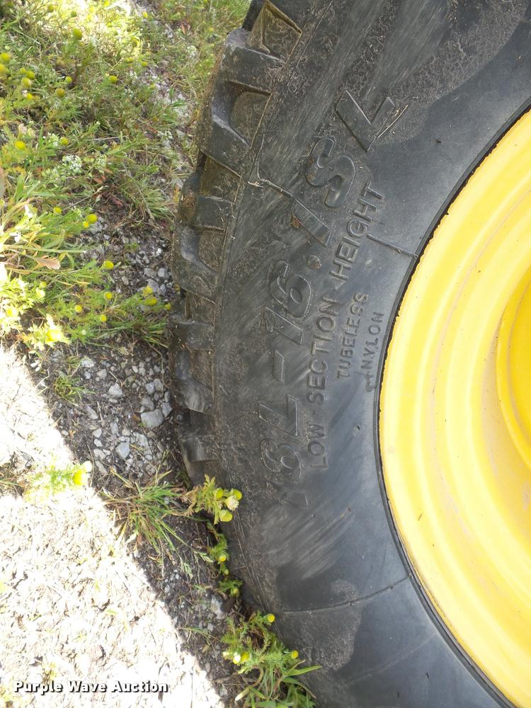 image for item DD9439 2014 New Holland Rollbelt 560 specialty crop baler