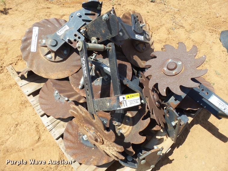 image for item DL9167 Yetter coulters and trash units