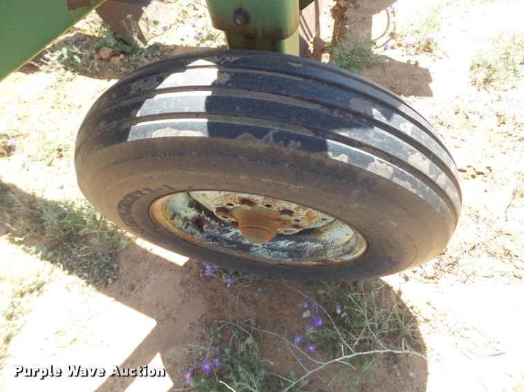 image for item DL9191 John Deere 965 switch plow