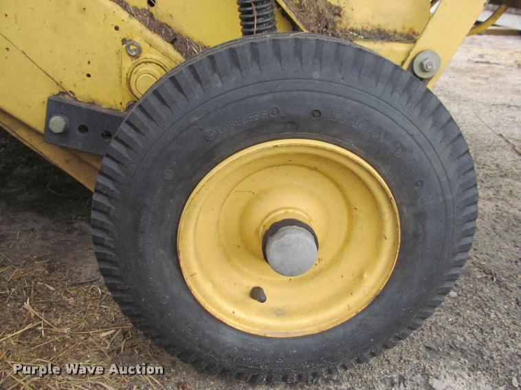 image for item K4881 1997 New Holland 664 round baler