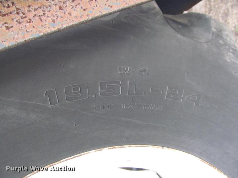 image for item K4889 Ford 3600 tractor with Brouwer sod harvester