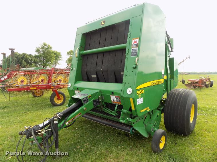 image for item J8629 2012 John Deere 568 Mega Wide Plus round baler