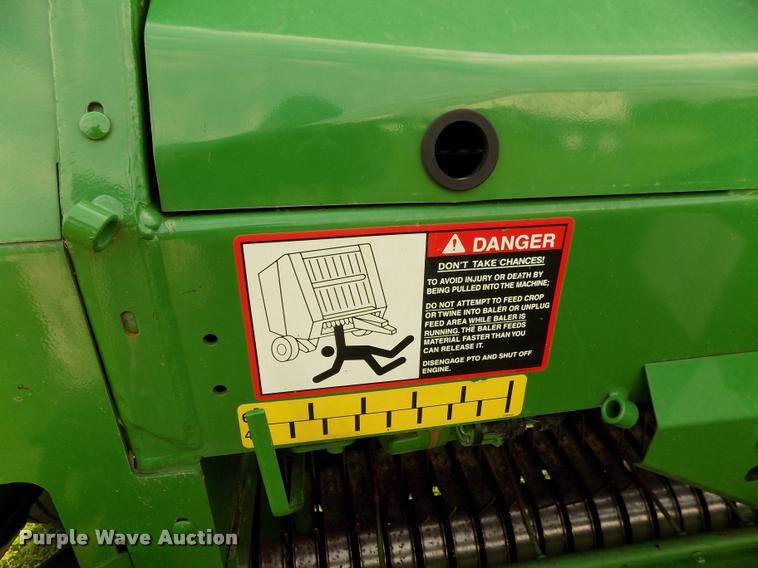 image for item J8629 2012 John Deere 568 Mega Wide Plus round baler