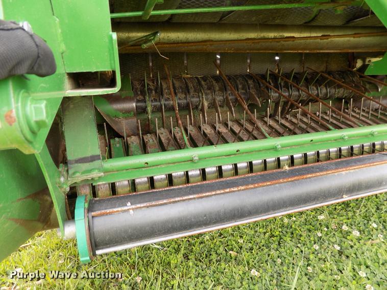 image for item J8629 2012 John Deere 568 Mega Wide Plus round baler