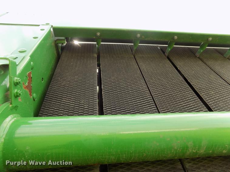 image for item J8629 2012 John Deere 568 Mega Wide Plus round baler