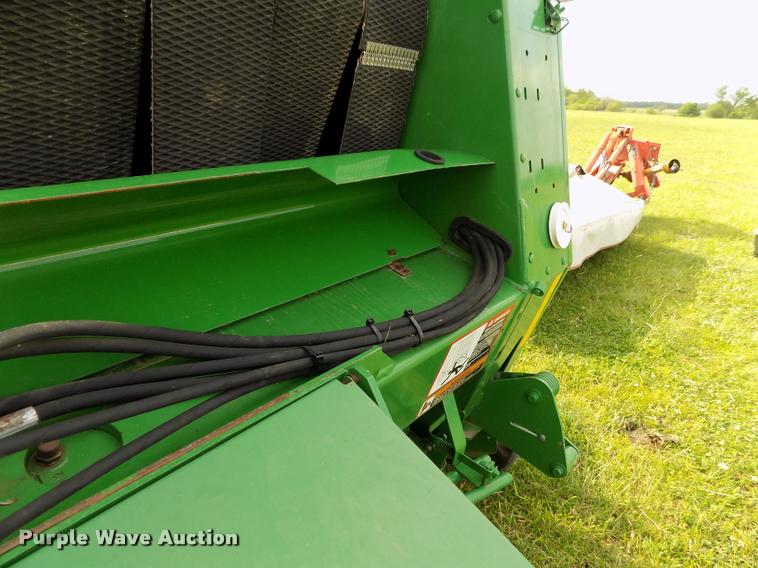 image for item J8629 2012 John Deere 568 Mega Wide Plus round baler