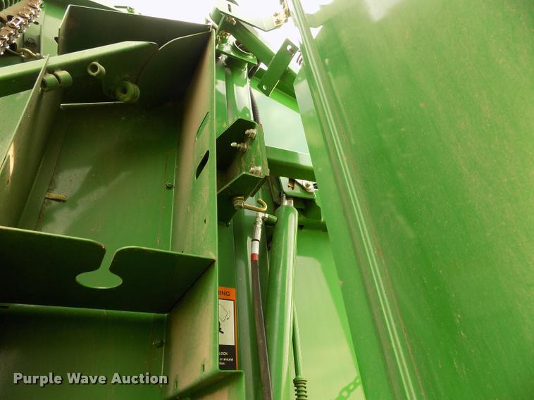 image for item J8629 2012 John Deere 568 Mega Wide Plus round baler