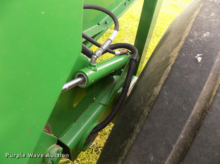 image for item J8629 2012 John Deere 568 Mega Wide Plus round baler