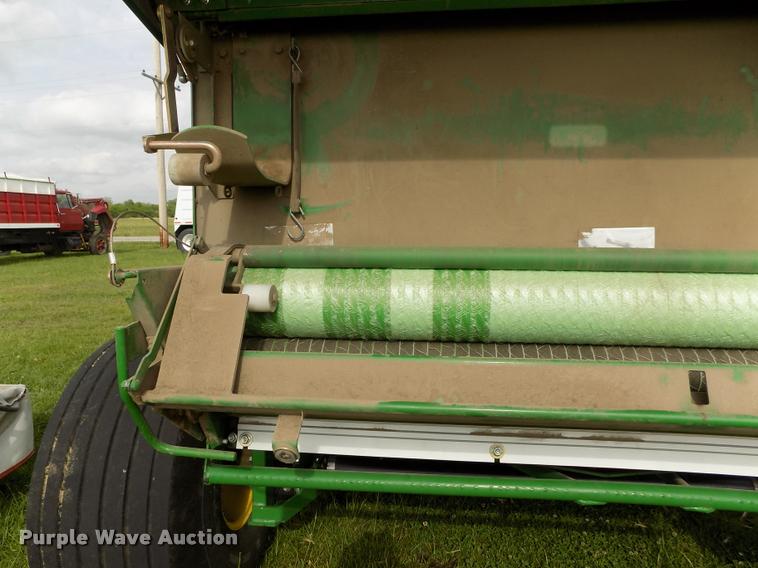 image for item J8629 2012 John Deere 568 Mega Wide Plus round baler