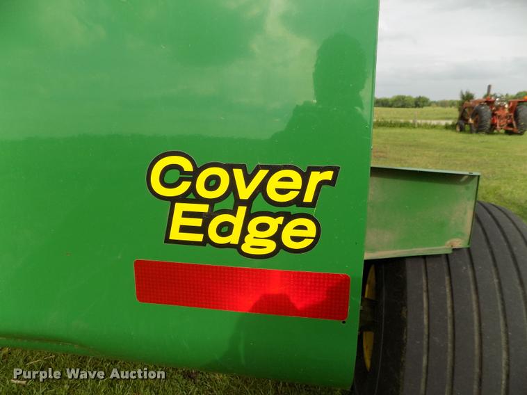 image for item J8629 2012 John Deere 568 Mega Wide Plus round baler