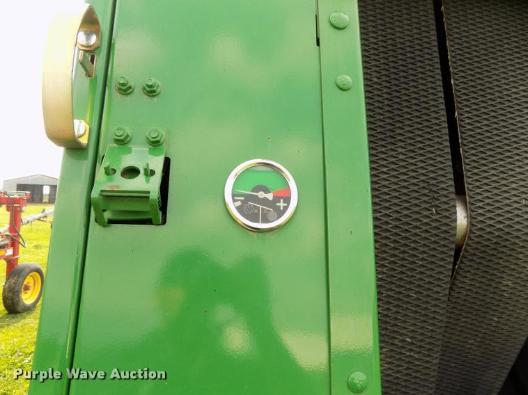 image for item J8629 2012 John Deere 568 Mega Wide Plus round baler