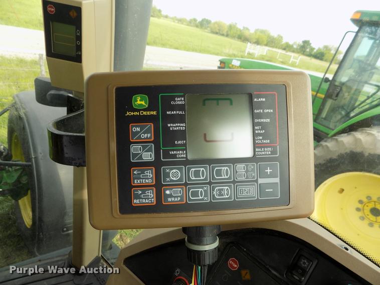 image for item J8629 2012 John Deere 568 Mega Wide Plus round baler