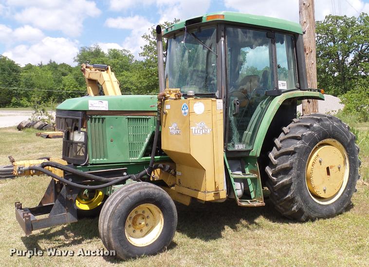 image for item DA6121 1998 John Deere 6310 tractor