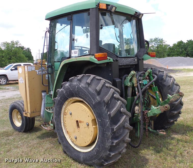 image for item DA6121 1998 John Deere 6310 tractor