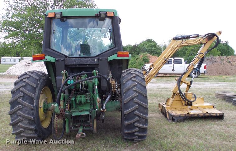 image for item DA6121 1998 John Deere 6310 tractor