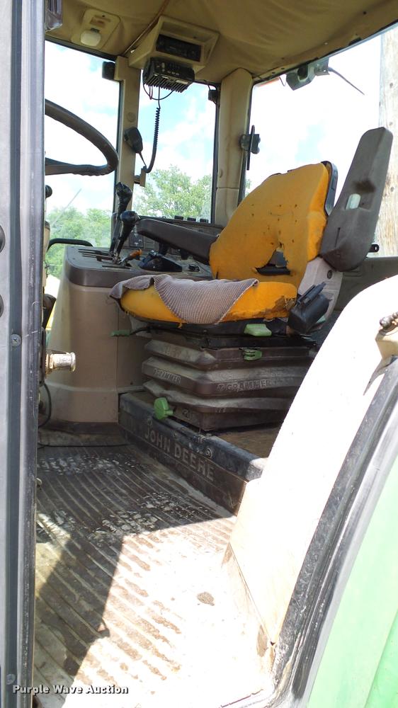 image for item DA6121 1998 John Deere 6310 tractor