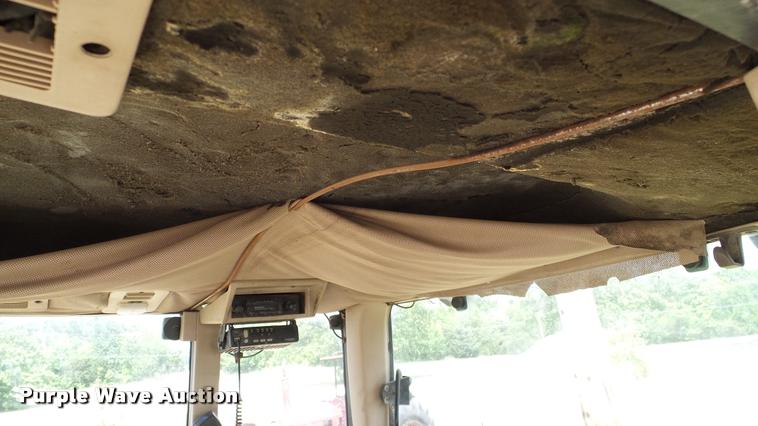 image for item DA6121 1998 John Deere 6310 tractor