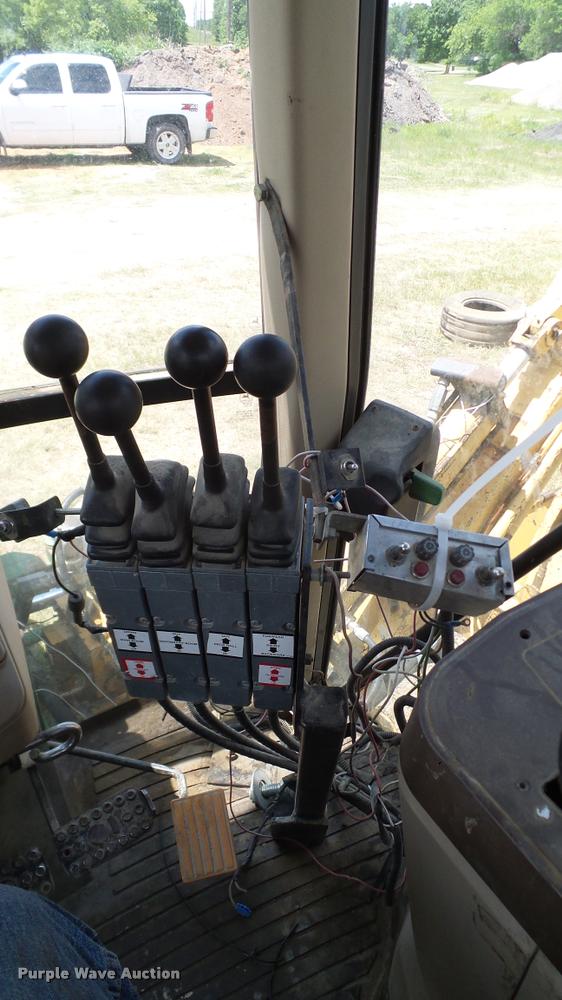 image for item DA6121 1998 John Deere 6310 tractor