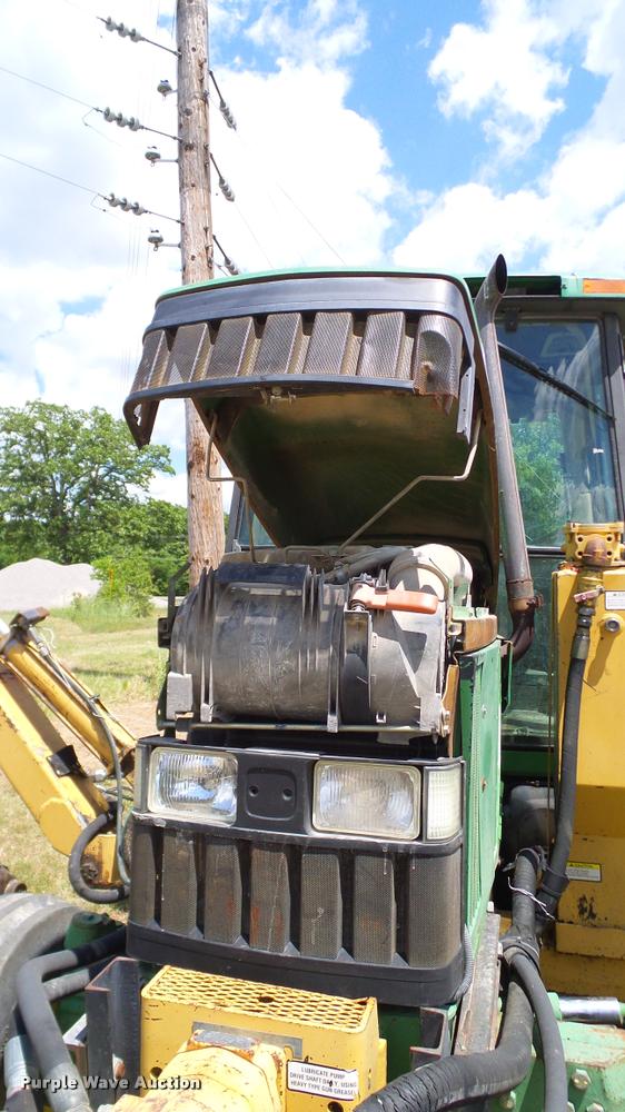 image for item DA6121 1998 John Deere 6310 tractor