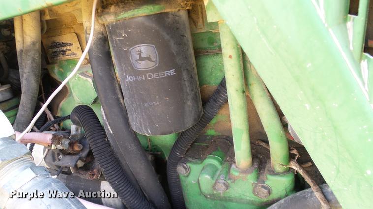 image for item DA6121 1998 John Deere 6310 tractor