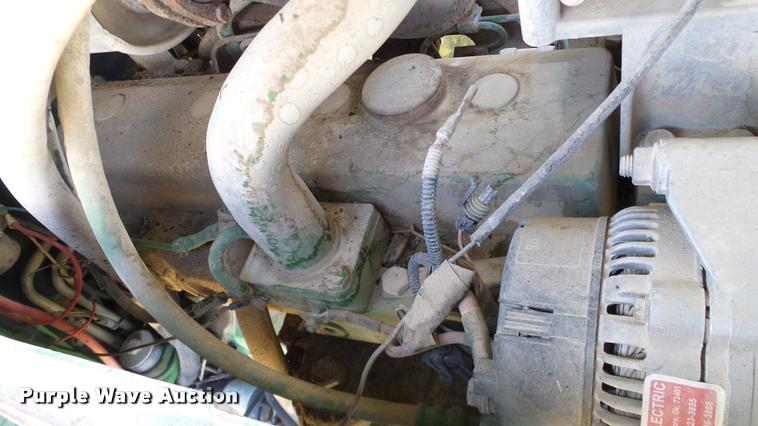 image for item DA6121 1998 John Deere 6310 tractor