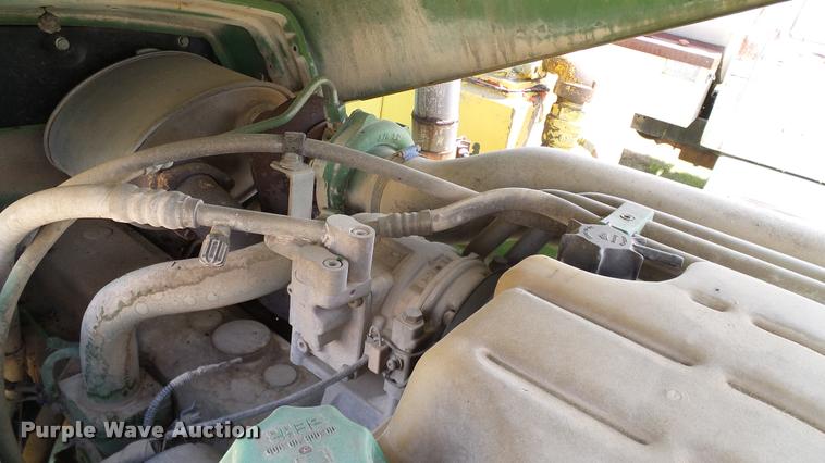 image for item DA6121 1998 John Deere 6310 tractor