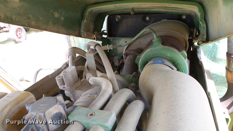 image for item DA6121 1998 John Deere 6310 tractor