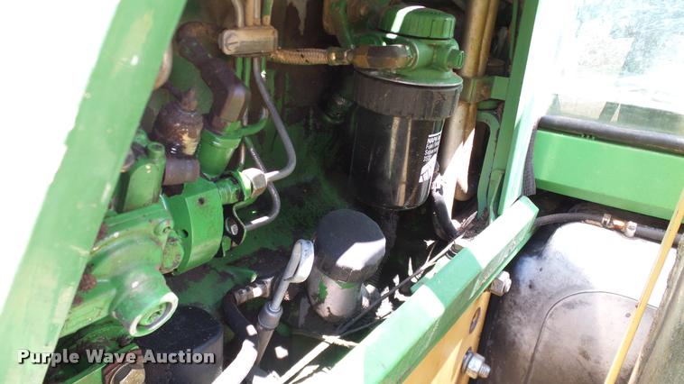 image for item DA6121 1998 John Deere 6310 tractor