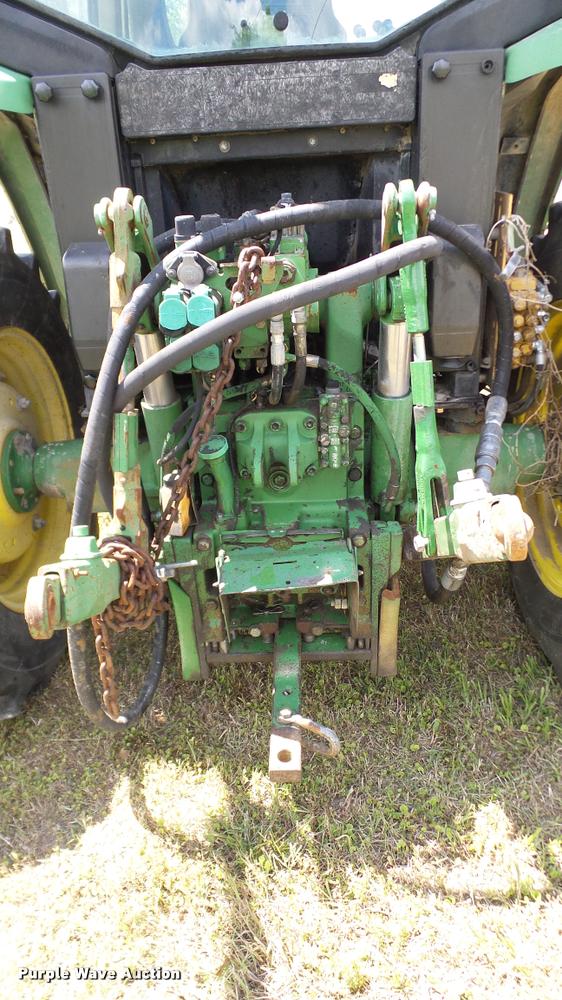 image for item DA6121 1998 John Deere 6310 tractor