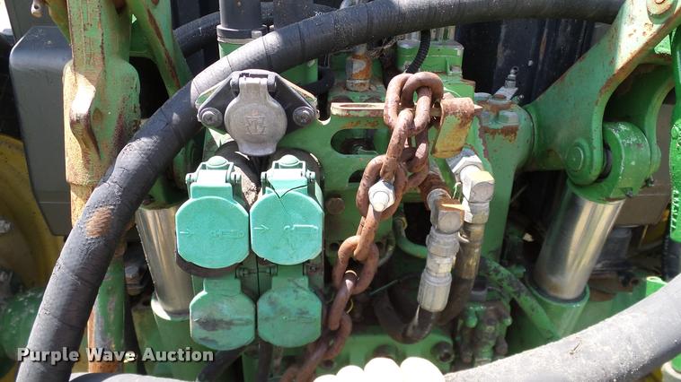 image for item DA6121 1998 John Deere 6310 tractor