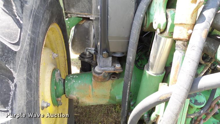 image for item DA6121 1998 John Deere 6310 tractor