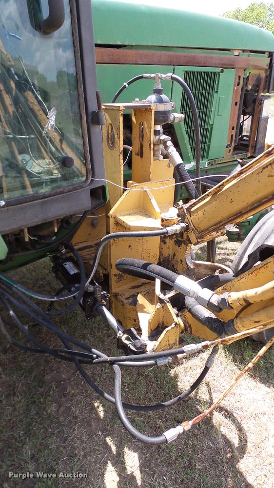 image for item DA6121 1998 John Deere 6310 tractor