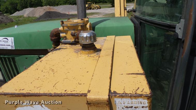 image for item DA6121 1998 John Deere 6310 tractor