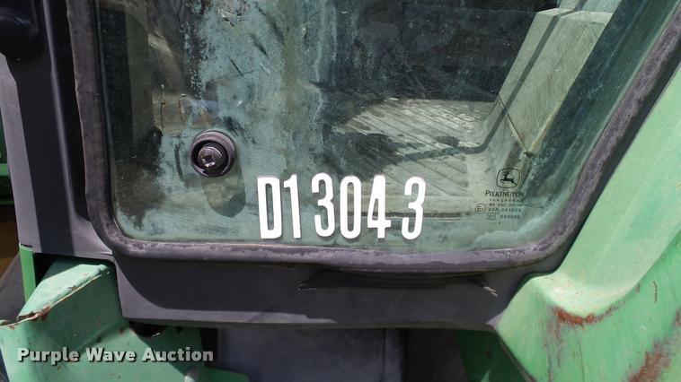 image for item DA6121 1998 John Deere 6310 tractor