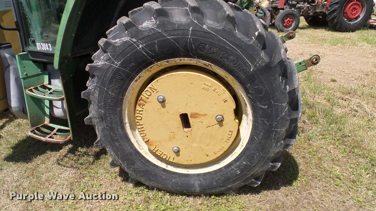 image for item DA6121 1998 John Deere 6310 tractor