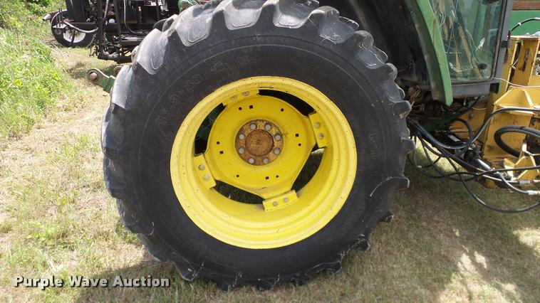 image for item DA6121 1998 John Deere 6310 tractor