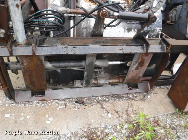 image for item DA8197 2000 Coneqtec Universal AP1000 skid steer planer